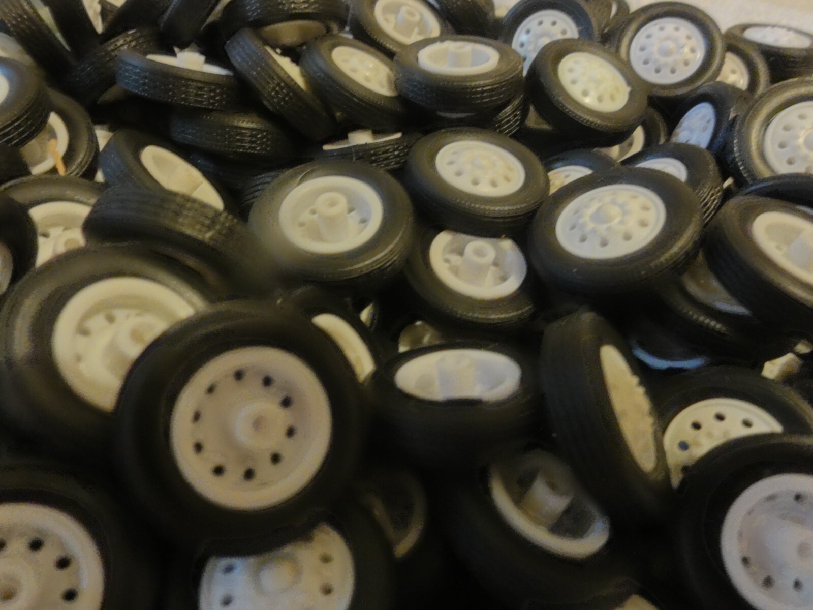 Large Lot Tonkin 1/50 Tires & WHITE color FRONT WHEELS 200+ pieces NEW Large Lot Tonkin 1/50 Tires & WHITE color FRONT WHEELS 200+ pieces NEW