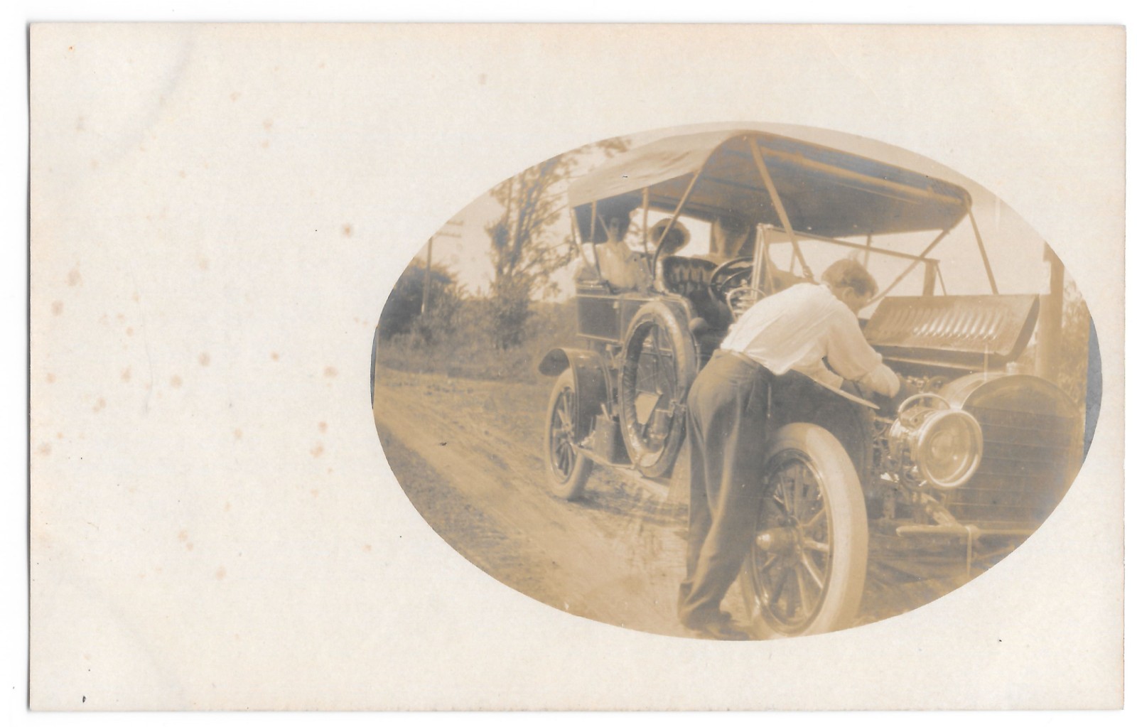 RPPC Early Auto Repair - Man Under Hood - Ladies in Hats, c1910 Postcard