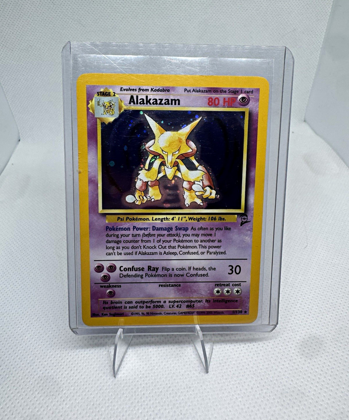 Wizards of the Coast Alakazam 1/102 Base Set Holo Rare 1999 English 80 HP Wizards of the Coast Alakazam 1/102 Base Set Holo Rare 1999 English 80 HP