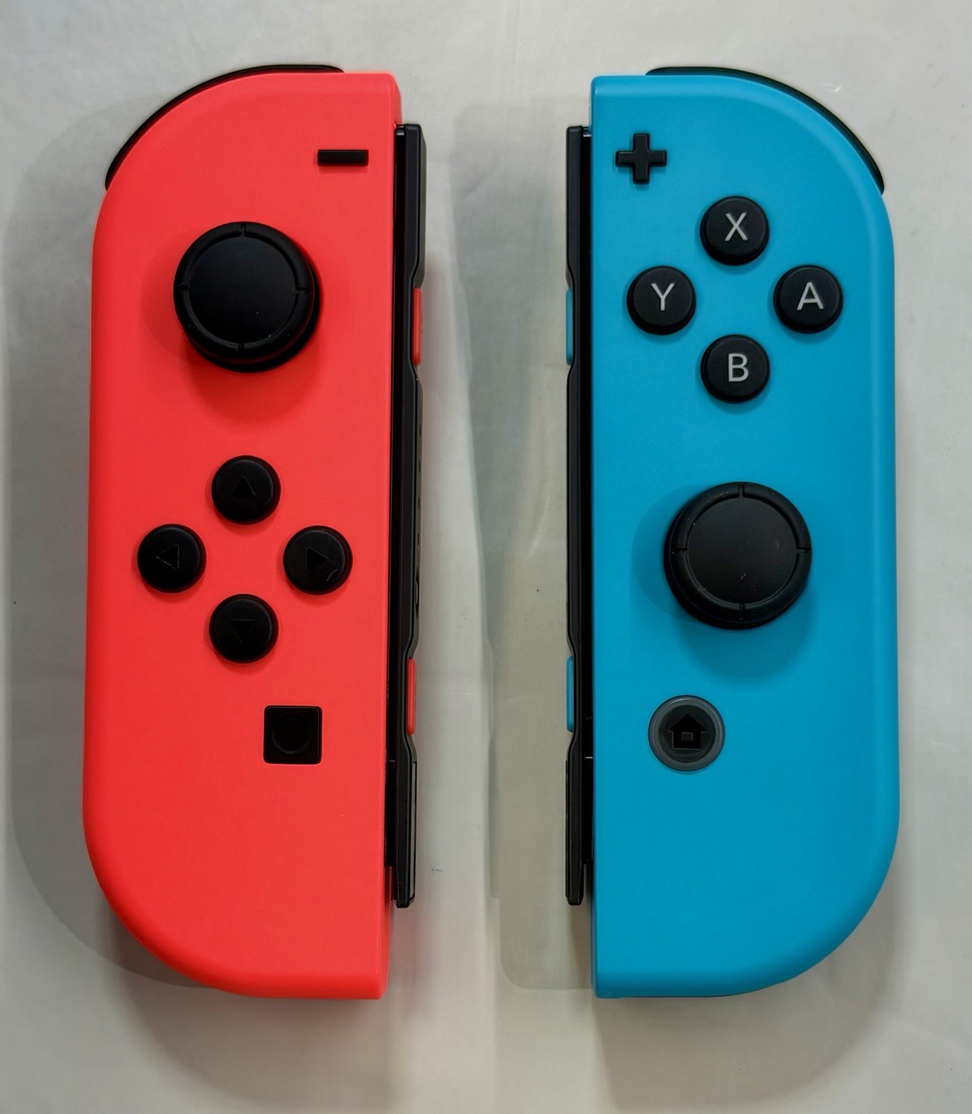 Nintendo Authentic Joy-Con Controller - Neon Red / Neon Blue - Tested - No Drift Nintendo Authentic Joy-Con Controller - Neon Red / Neon Blue - Tested - No Drift