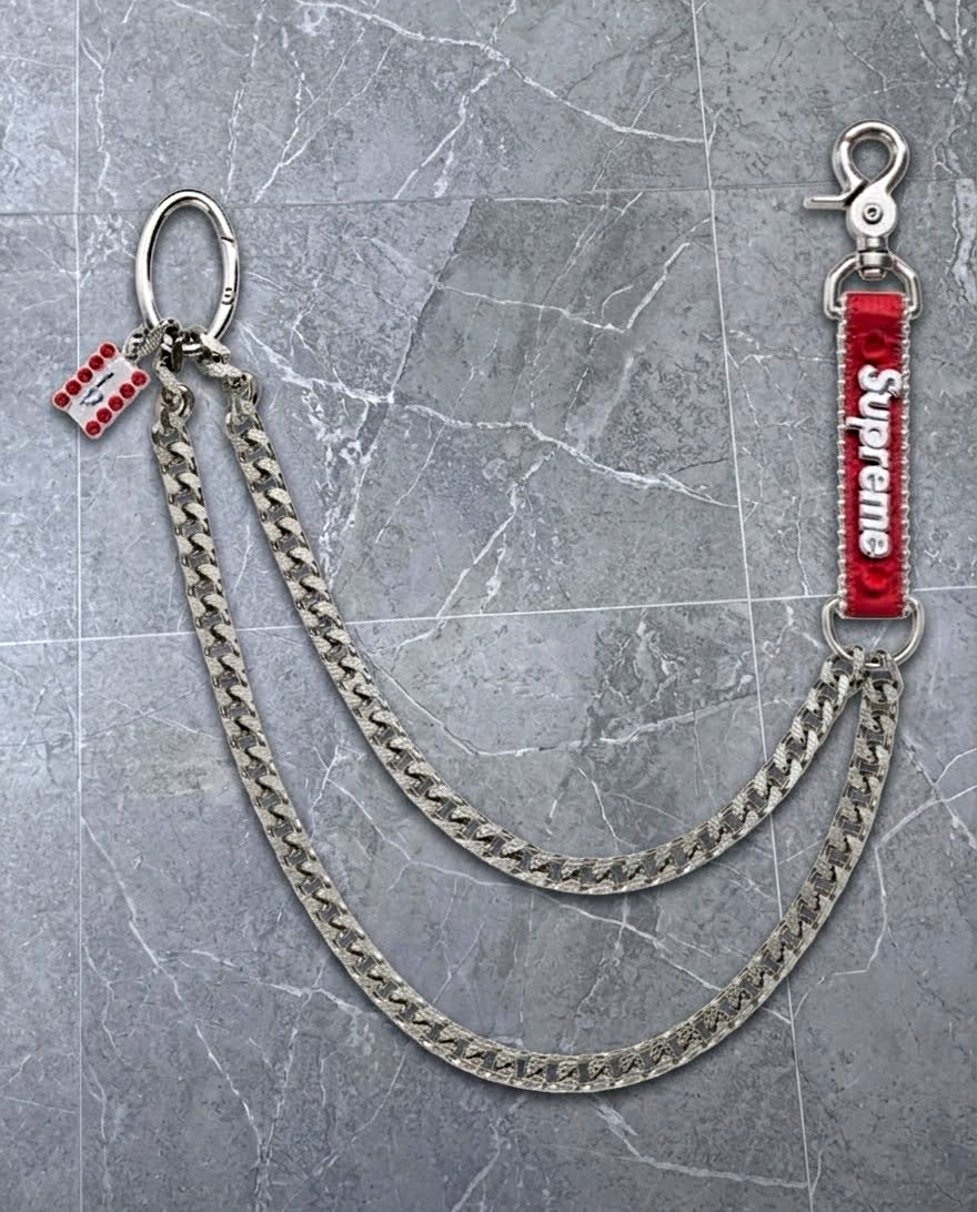 Supreme B.B. Simon Chain Red In Hand FW26 Supreme B.B. Simon Chain Red In Hand FW26