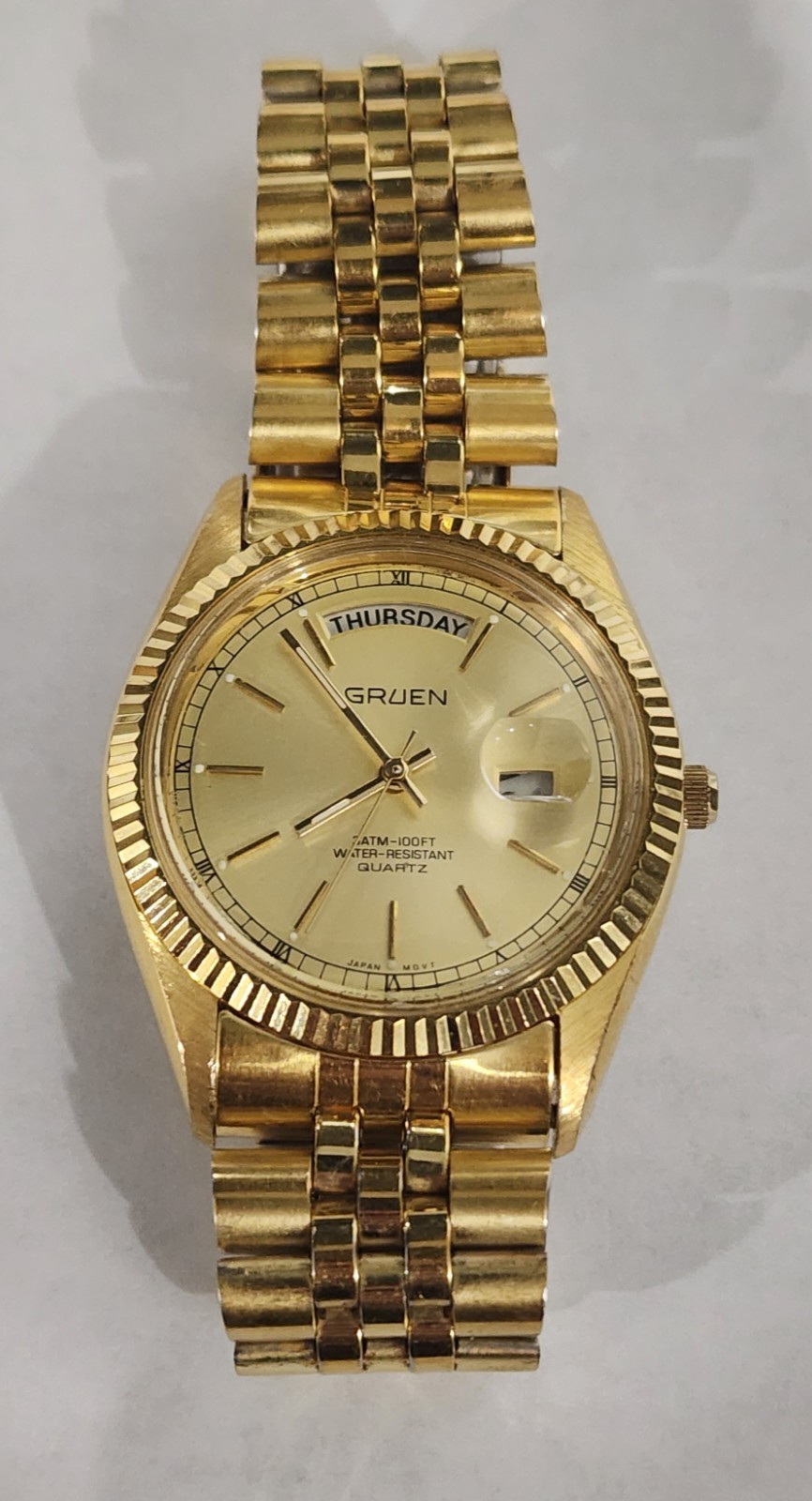 Vintage Gruen Day Date Gold Tone Watch Fluted Bezel Quartz