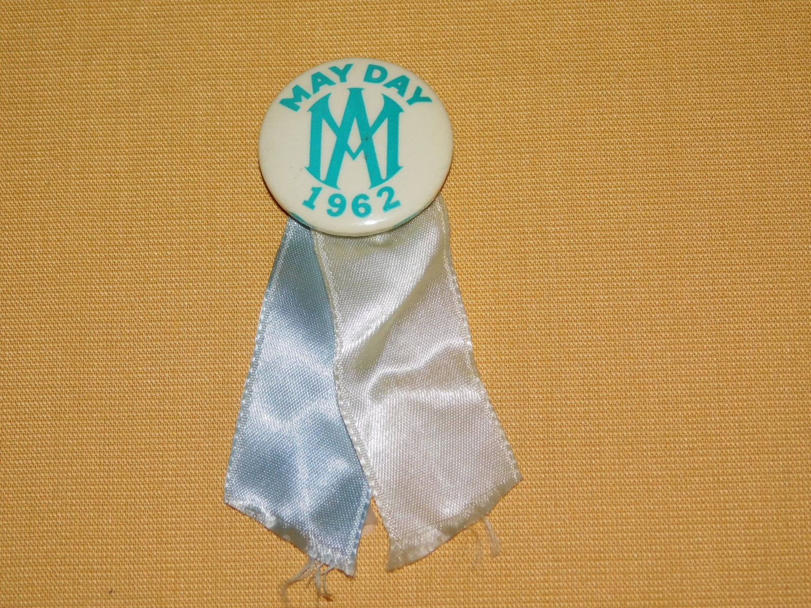 VINTAGE MAY DAY 1962 PINBACK BUTTON & RIBBON VINTAGE MAY DAY 1962 PINBACK BUTTON & RIBBON
