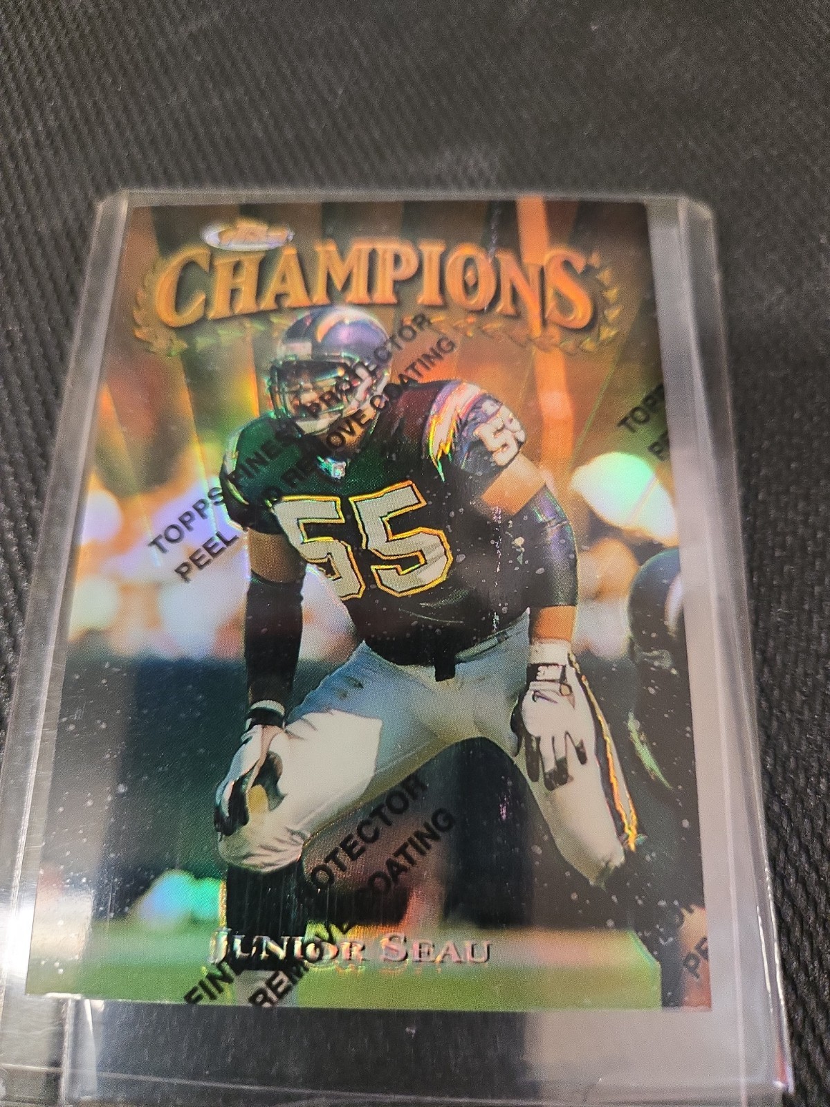 1997 Topps Finest GOLD RARE Refractor w/peel Junior Seau Chargers #348 1997 Topps Finest GOLD RARE Refractor w/peel Junior Seau Chargers #348