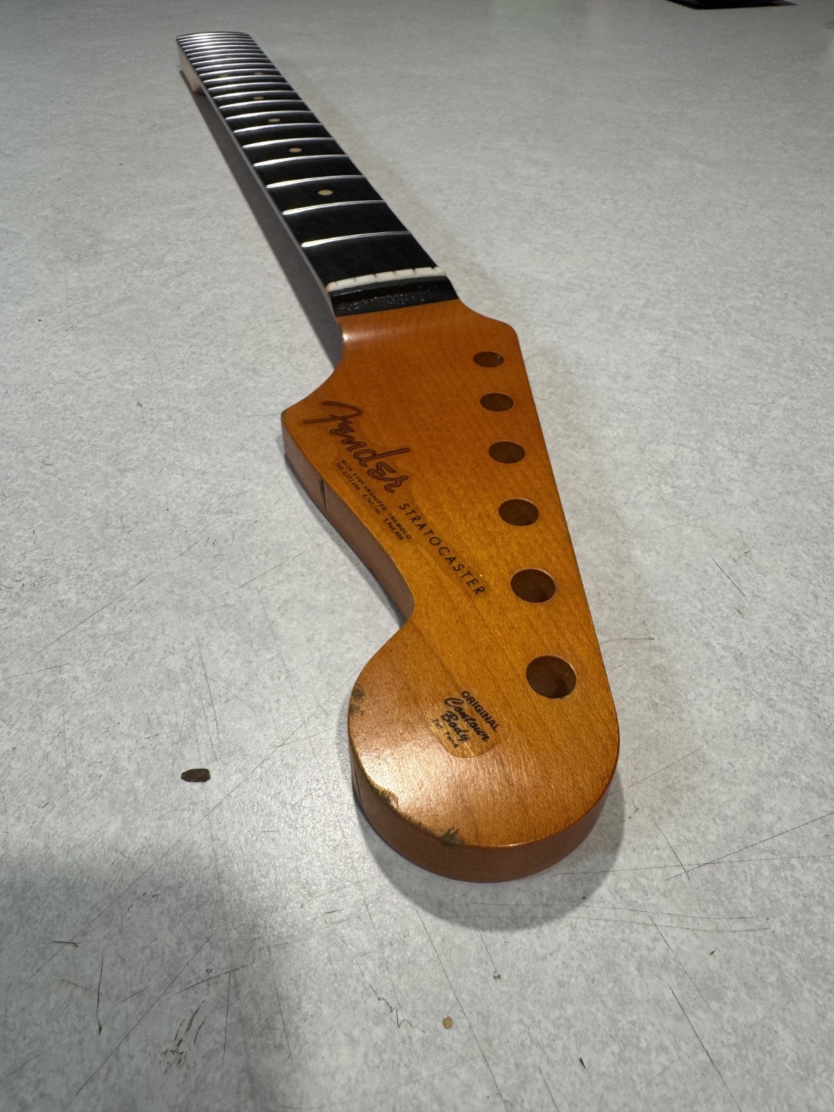 Aftermarket Relic Stratocaster Neck - 100% Nitro Lacquer & Clay Dots Aftermarket Relic Stratocaster Neck - 100% Nitro Lacquer & Clay Dots