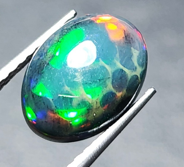 Ethiopian Black Honeycomb Opal Smoked Oval Welo 1.35Ct Top Fire Play Rare Stone