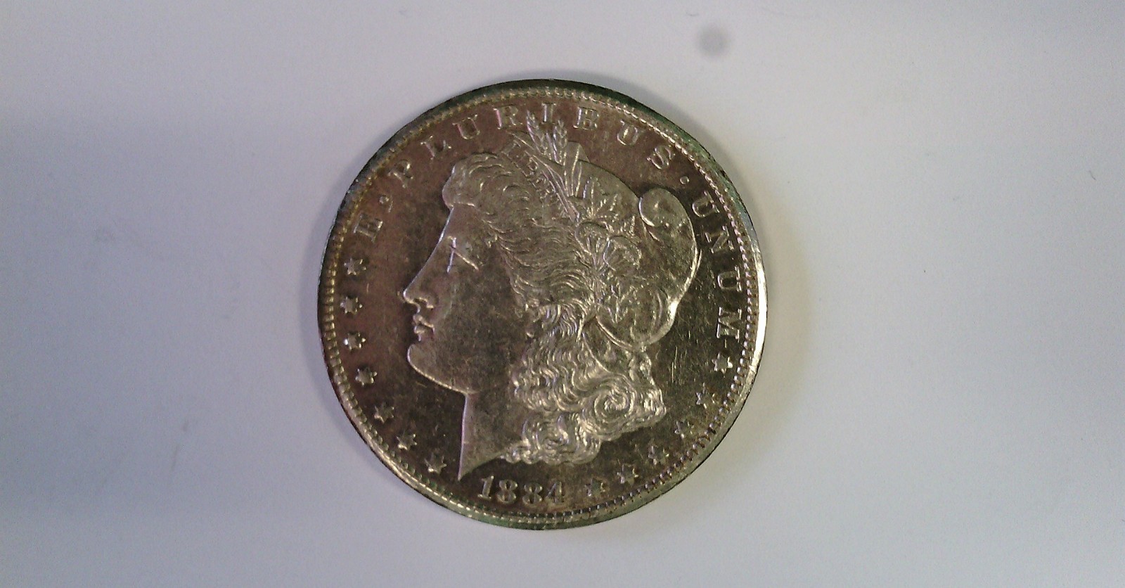 1884-cc US SILVER MORGAN DOLLAR. UNGRADED. GOOD BOOK FILLER. CHECK IT OUT