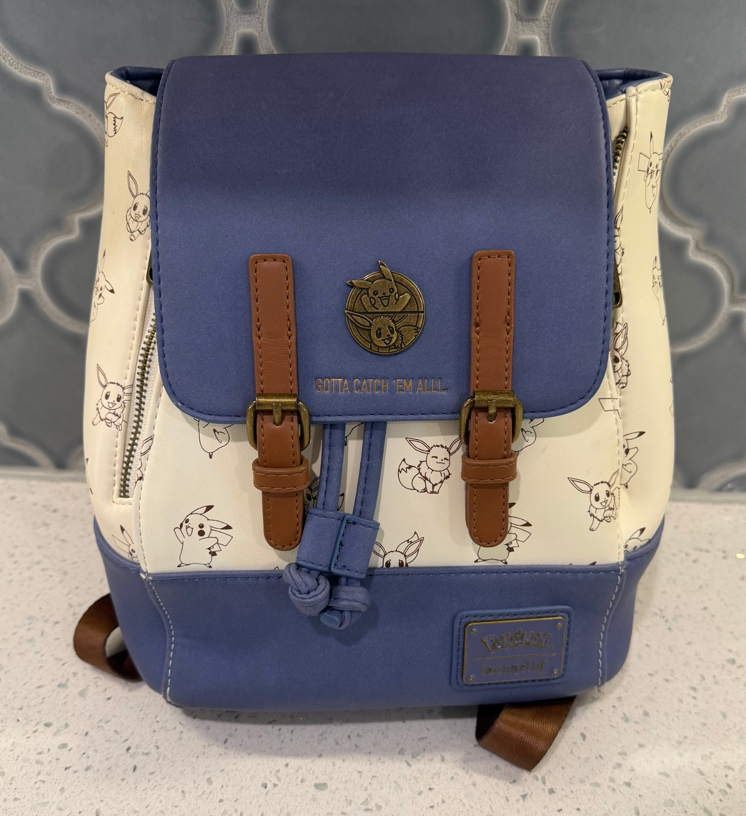 Loungefly Pokémon Pikachu Eevee Drawstring Flap Mini Backpack Used Cream Blue