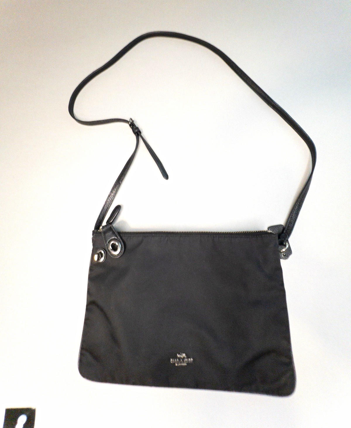 Coach Nylon Black Crossbody Bag. Unique lock and zip closure.