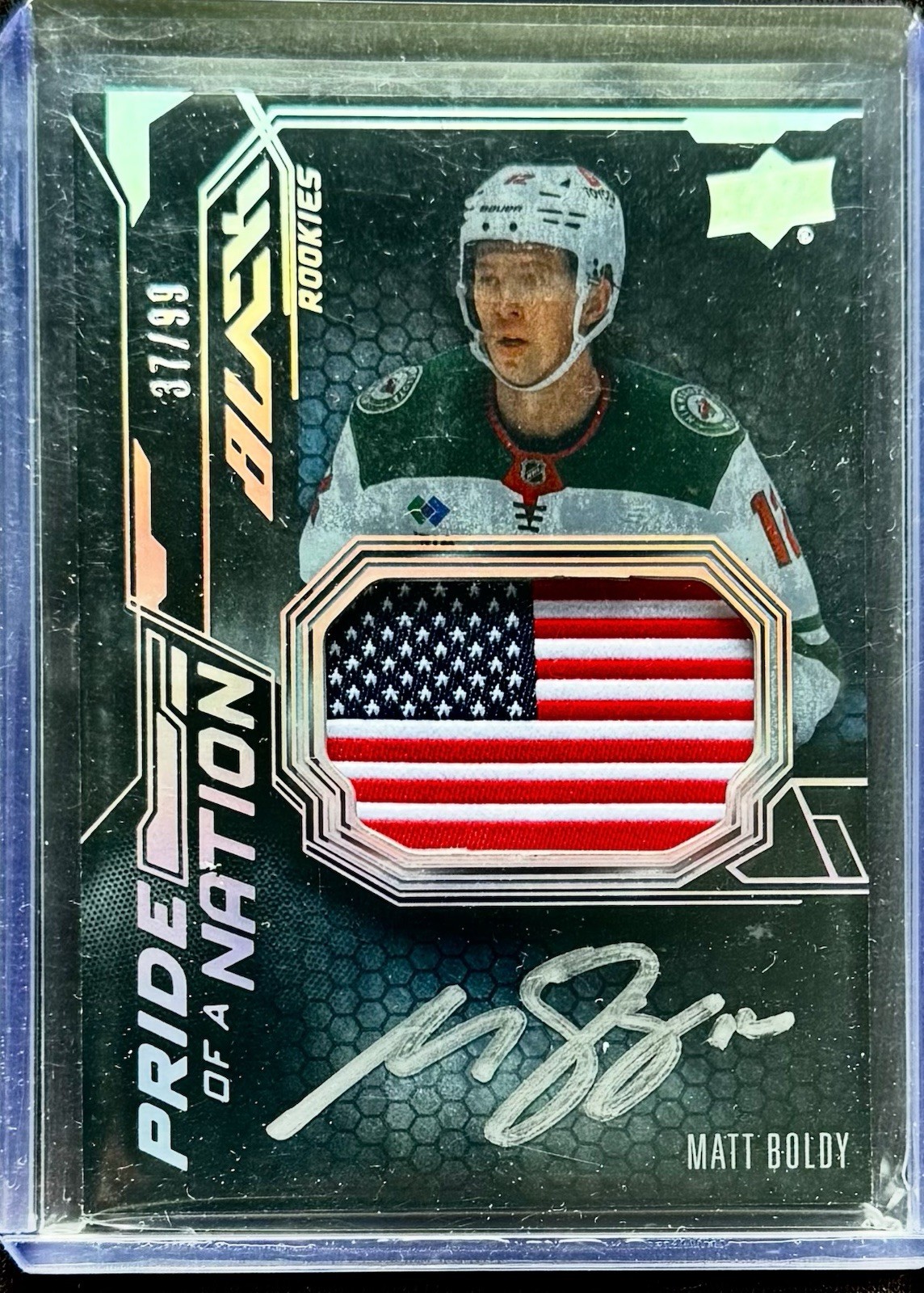 2022-23 Upper Deck SPX Pride of Nation Matt Boldy /99 (RC,AU)