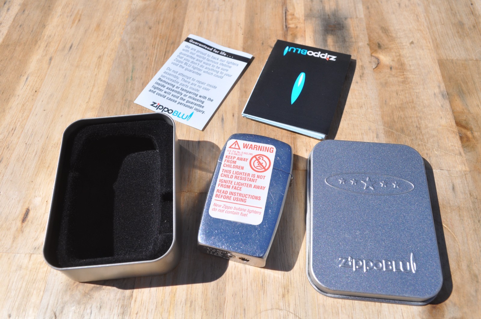 Discontinued Zippo BLU Satin Chrome Blue Flame Lighter & Tin 2007 Discontinued Zippo BLU Satin Chrome Blue Flame Lighter & Tin 2007