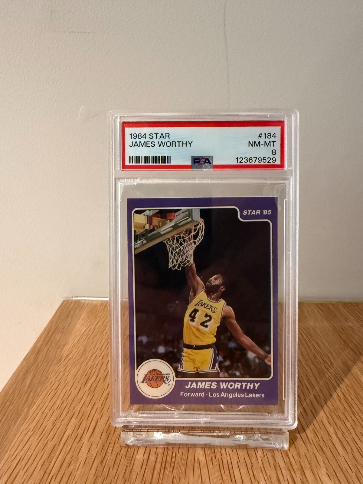 1984 STAR #184 JAMES WORTHY PSA 8 NM-MINT LOS ANGELES LAKERS LEGEND 1984 STAR #184 JAMES WORTHY PSA 8 NM-MINT LOS ANGELES LAKERS LEGEND