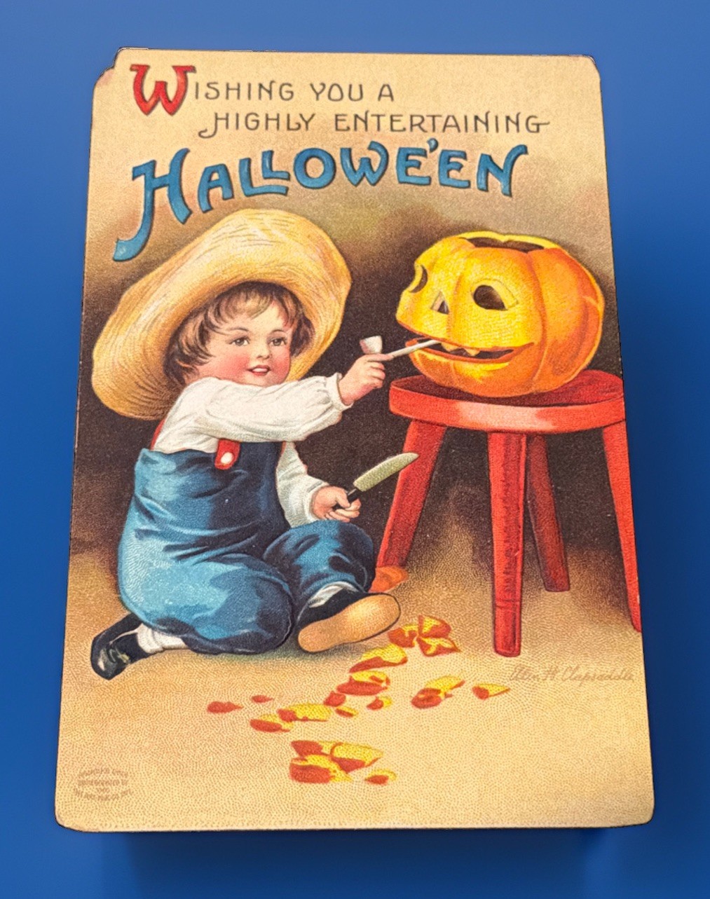 Antique  Embossed Clapsaddle Halloween Postcard Boy Carving Jack-O-Lantern