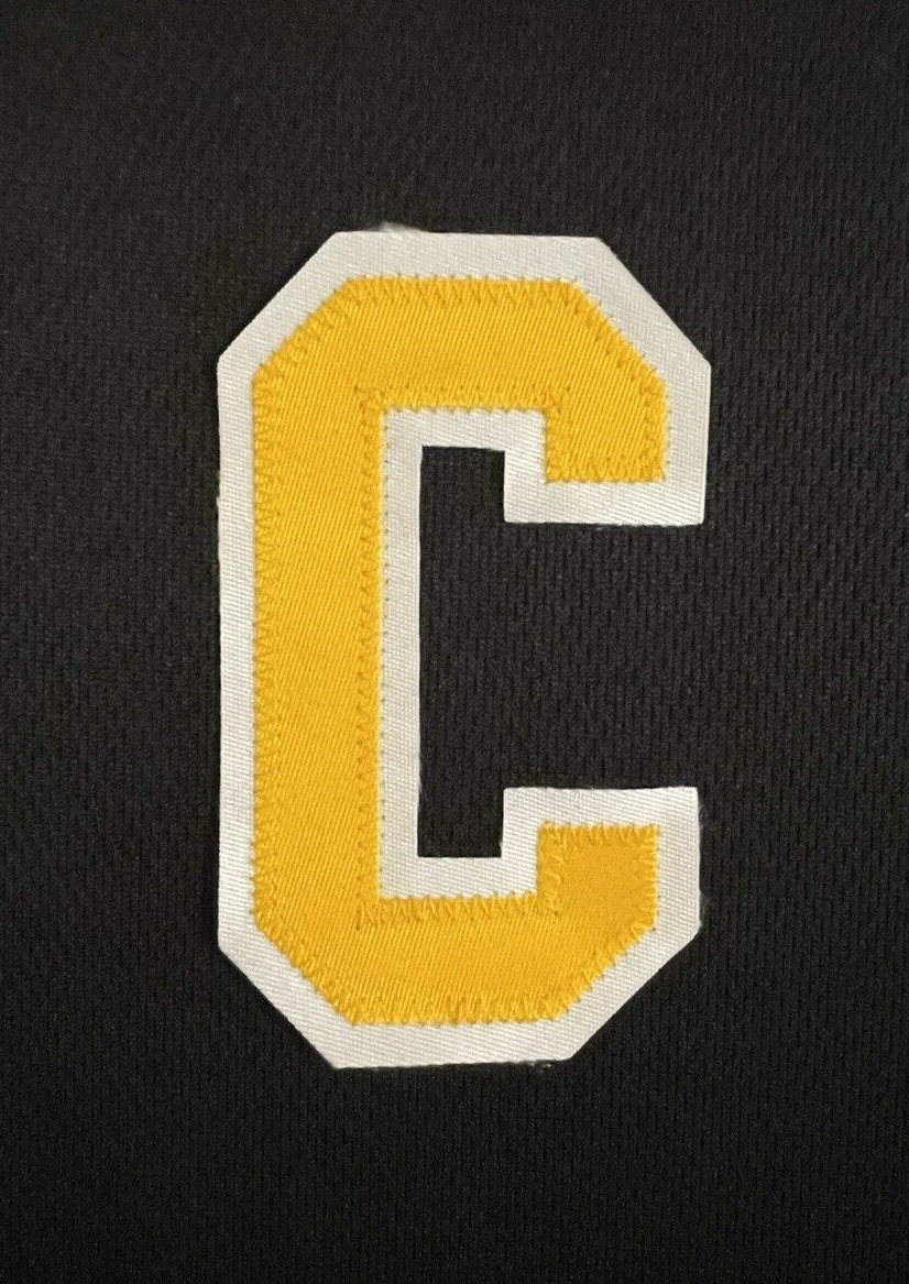 2020-25 Boston Bruins home or alternate black jersey Captain C Marchand Patch