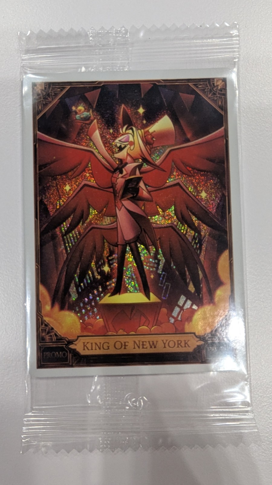 NYCC 2026 PSA HAZBIN HOTEL LUCIFER KING OF NEW YORK PROMO CARD IN HAND NYCC 2026 PSA HAZBIN HOTEL LUCIFER KING OF NEW YORK PROMO CARD IN HAND