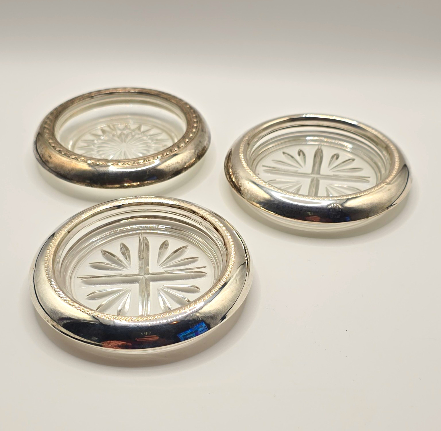 3 Vintage F.B. Rogers Sterling Silver (.925) Rim Cut Glass Coasters Starburst 3 Vintage F.B. Rogers Sterling Silver (.925) Rim Cut Glass Coasters Starburst