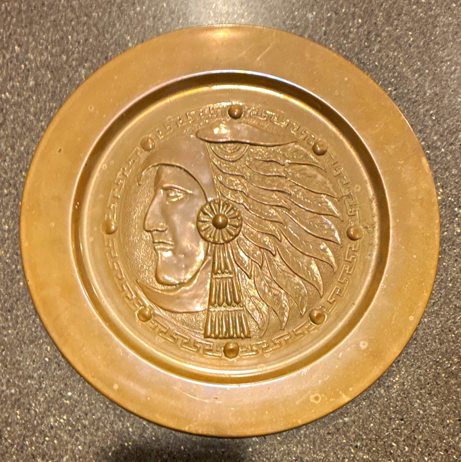 Mid-20th-century vintage Mexican repoussé (hand-hammered) brass wall plaque Mid-20th-century vintage Mexican repoussé (hand-hammered) brass wall plaque