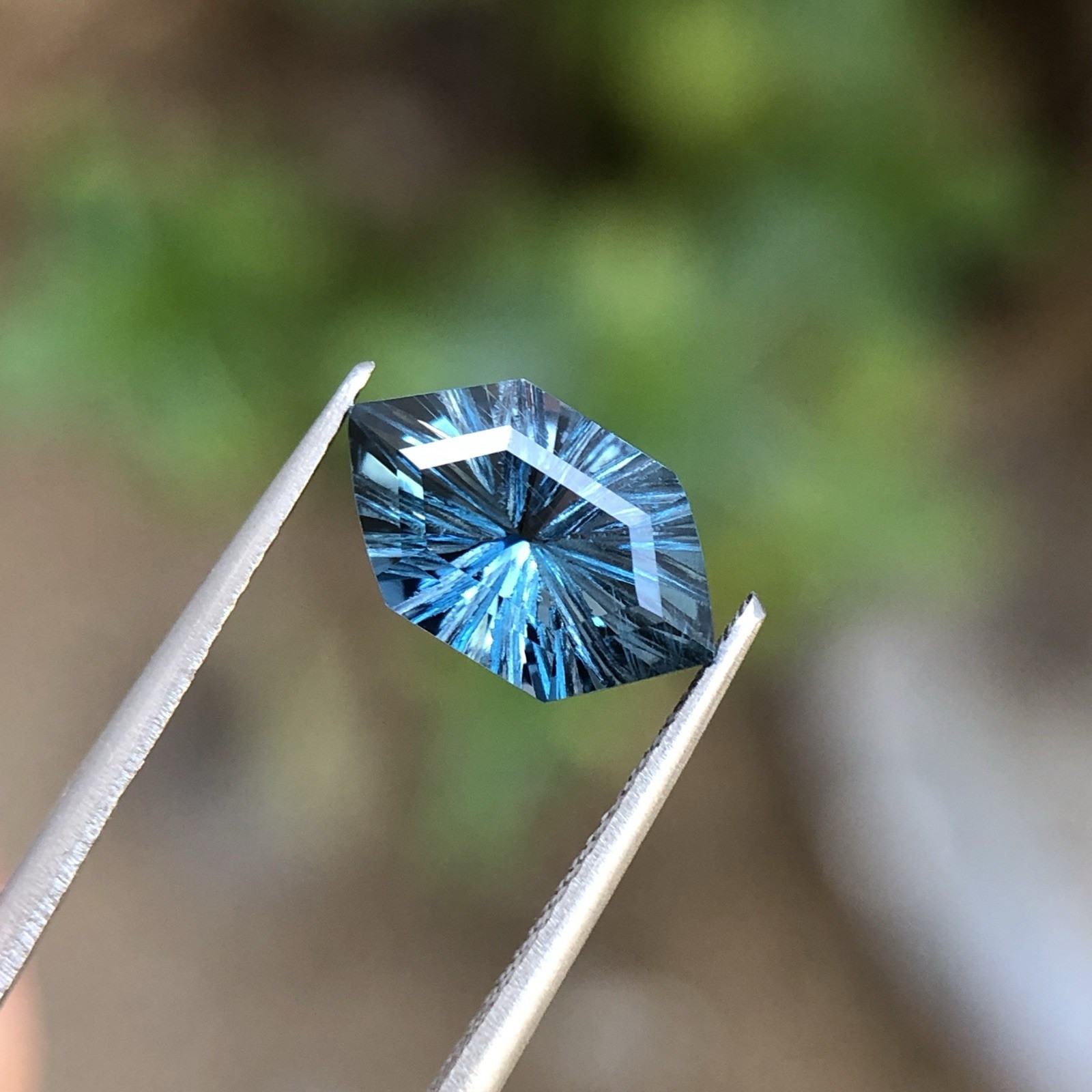 Natural London Blue Topaz Fantasy Cut Long Hexagon 12.5 MM 3.90 Carat. Natural London Blue Topaz Fantasy Cut Long Hexagon 12.5 MM 3.90 Carat.