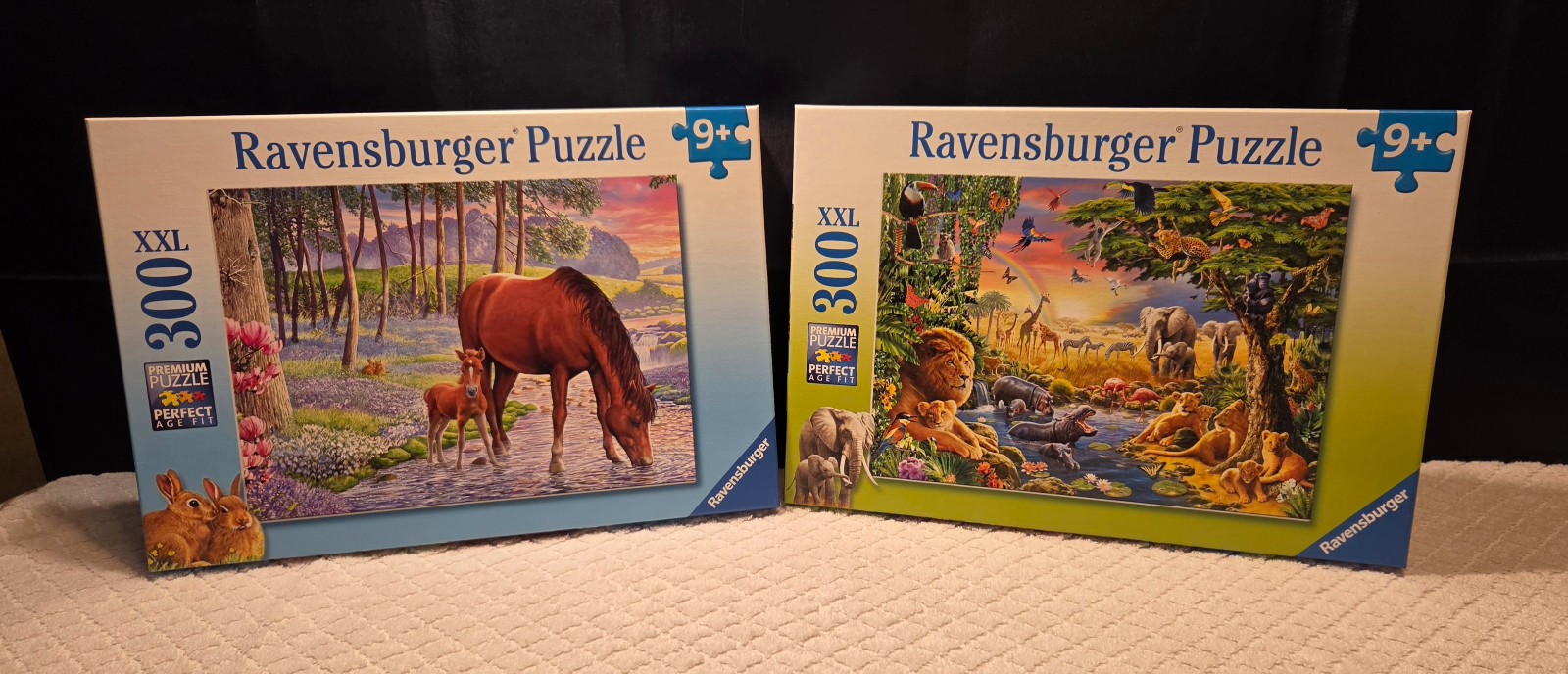 2 Ravensburger 300 Piece XXL Puzzles Serene Sunset & Evening at the Waterhole 2 Ravensburger 300 Piece XXL Puzzles Serene Sunset & Evening at the Waterhole