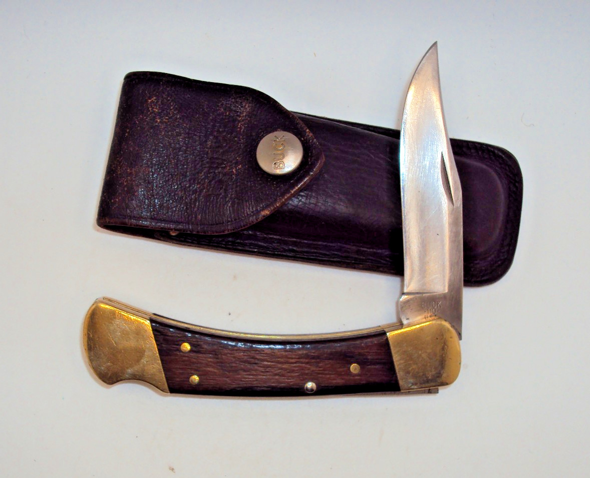 Vintage Buck 110 U.S.A.folding hunter with leather sheath 1974 to 1980 Vintage Buck 110 U.S.A.folding hunter with leather sheath 1974 to 1980