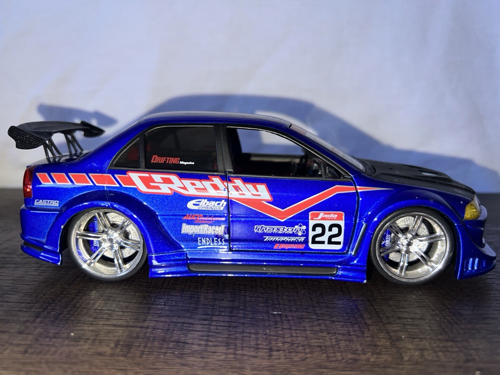 Jada Toys Import Racer 1:24 Mitsubishi Lancer Evolution VI -GReddy- USED Jada Toys Import Racer 1:24 Mitsubishi Lancer Evolution VI -GReddy- USED