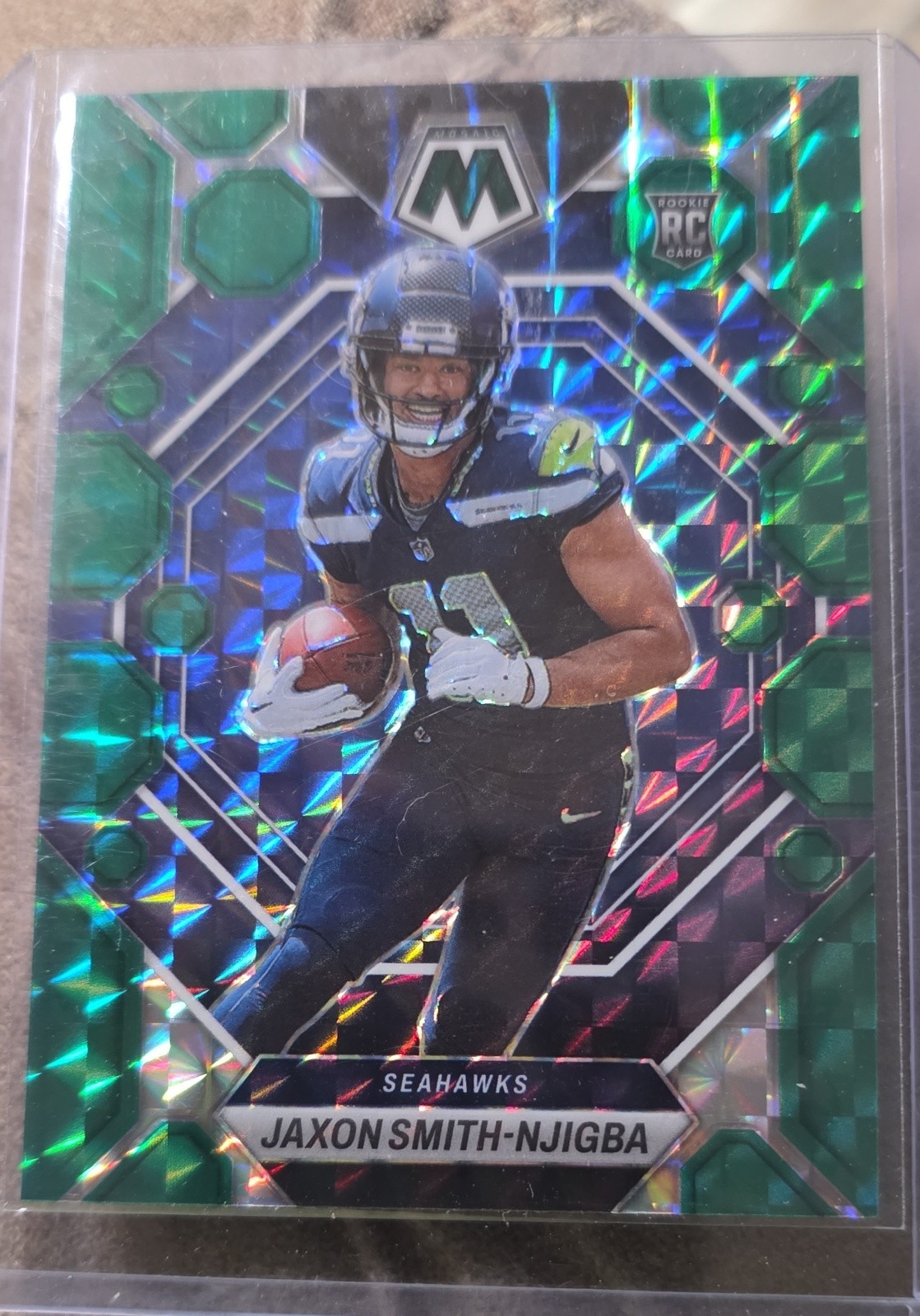 2023 Panini Mosaic - Rookies Jaxon Smith-Njigba #331 Green Mosaic Prizm (RC) 2023 Panini Mosaic - Rookies Jaxon Smith-Njigba #331 Green Mosaic Prizm (RC)