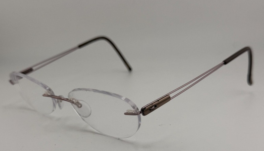 Silhouette Frames Only Titanium Rimless Eyeglasses 7661 40 6066 Brown 49-17-140 Silhouette Frames Only Titanium Rimless Eyeglasses 7661 40 6066 Brown 49-17-140