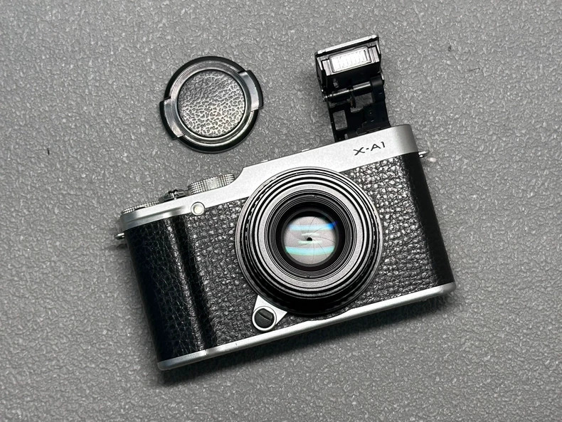 FUJIFILM X-A1 16.3MP Mirrorless Digital Camera W/ 35mm f/1.6 MF lens English FUJIFILM X-A1 16.3MP Mirrorless Digital Camera W/ 35mm f/1.6 MF lens English