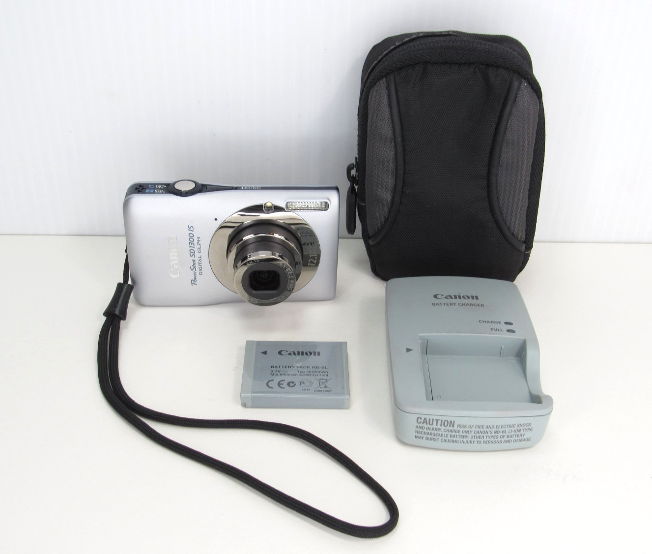 READ Canon PowerShot SD1300 IS Digital Camera ELPH 12.1MP 4X Zoom + Charger +Bat