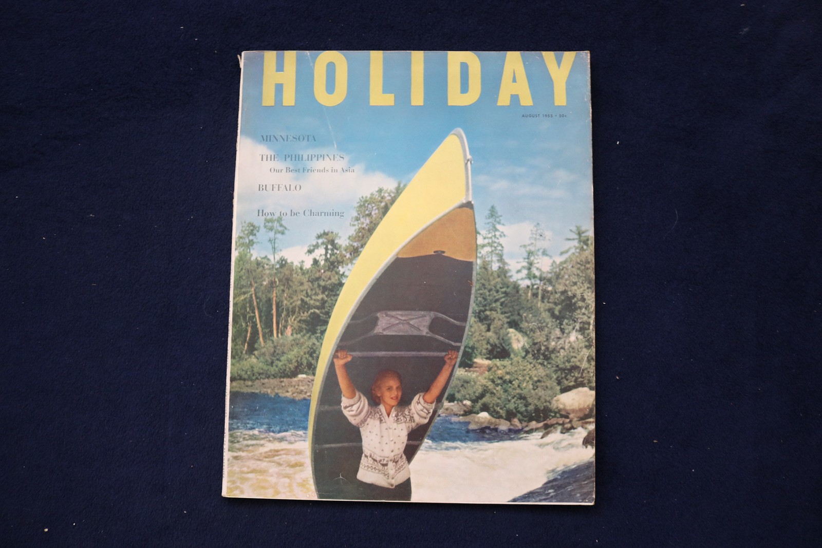 1955 AUGUST HOLIDAY MAGAZINE - WOMAN WITH CANOE COVER - E 34310