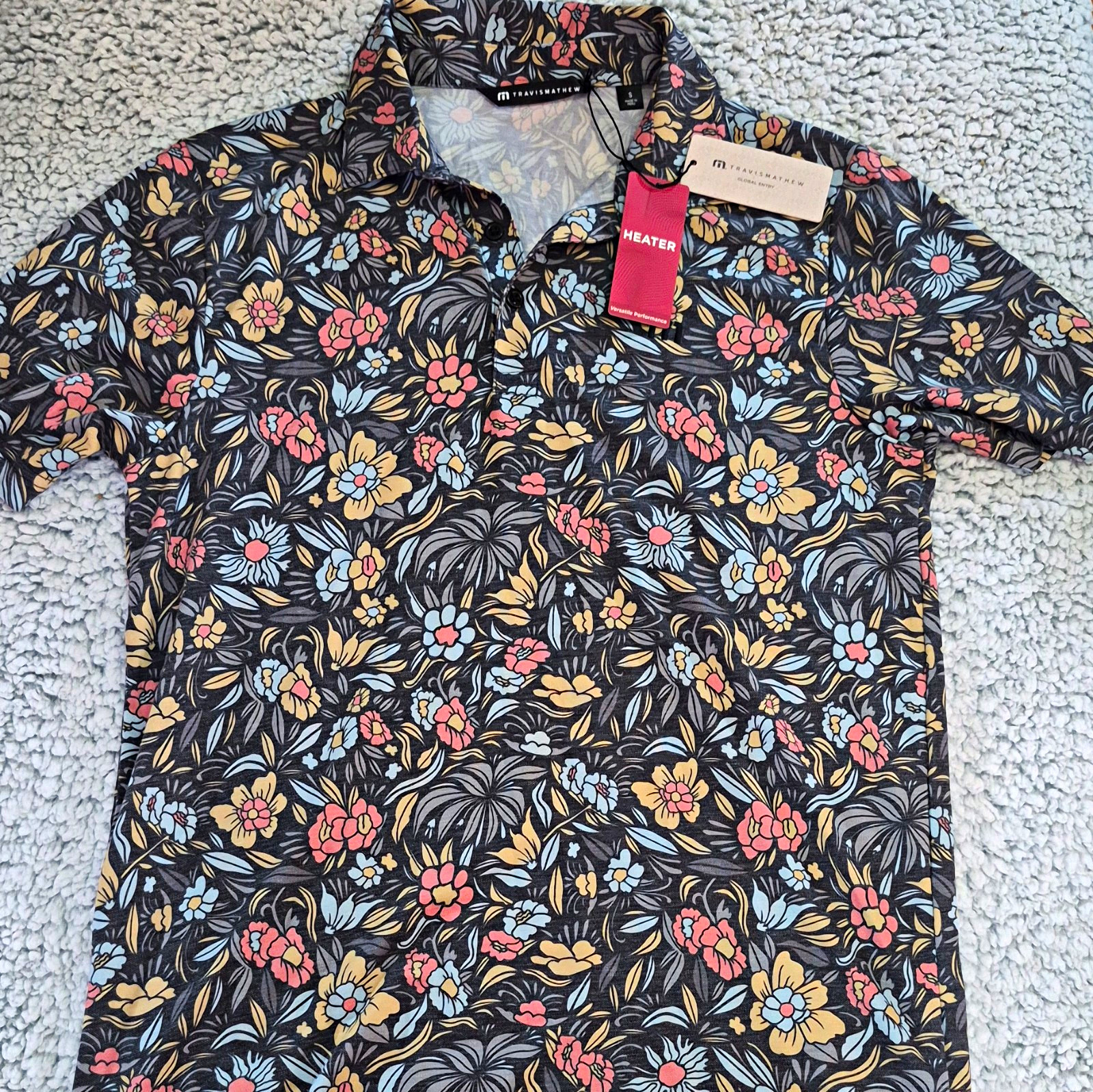 TravisMathew Global Entry Men\'s S Black Floral Short Sleeve Polo Shirt TravisMathew Global Entry Men\'s S Black Floral Short Sleeve Polo Shirt