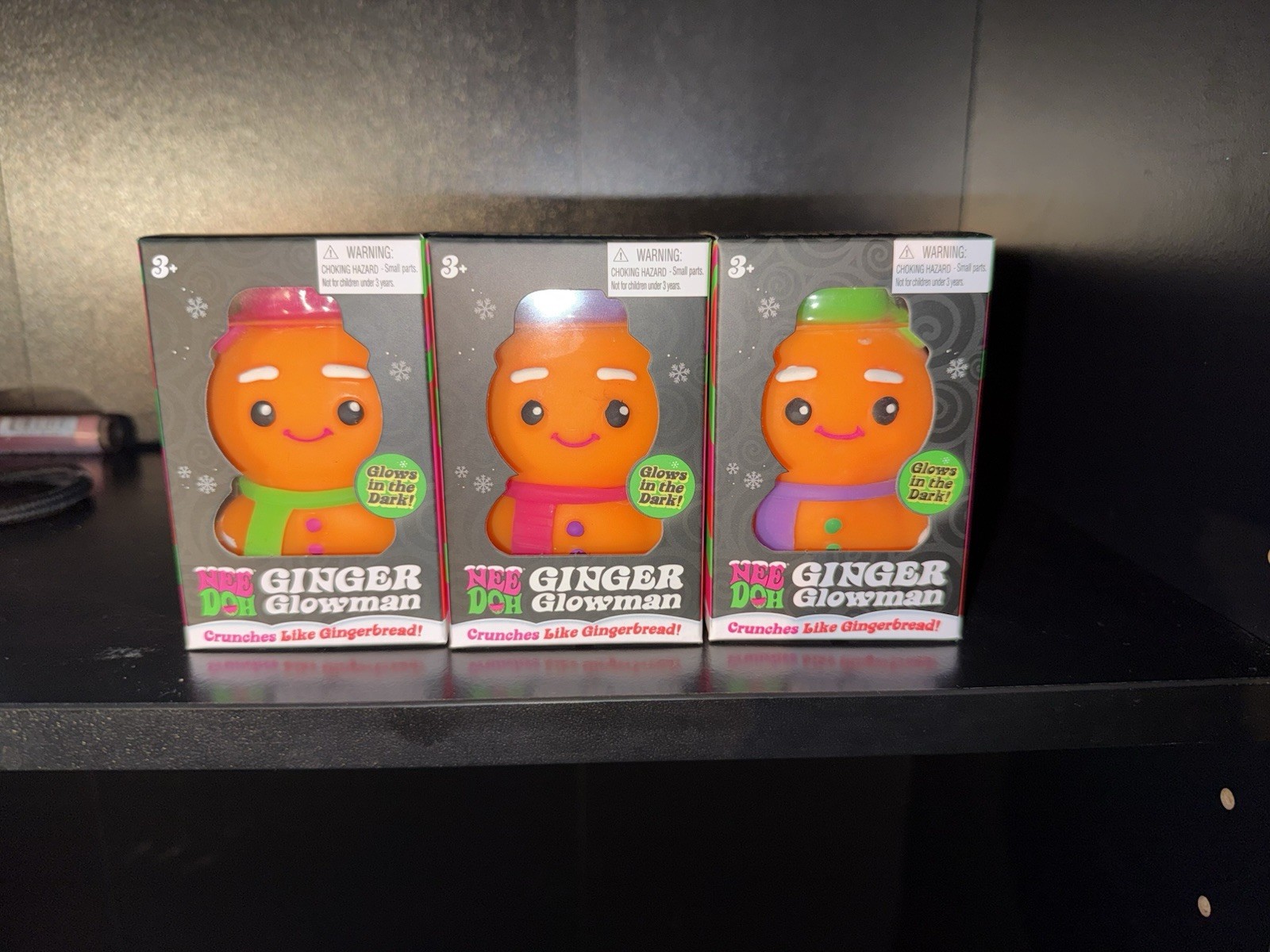 Nee Doh Ginger Glowman Squeeze Toy Purple, Pink, or Green Scarf. SOLD SEPARATE Nee Doh Ginger Glowman Squeeze Toy Purple, Pink, or Green Scarf. SOLD SEPARATE