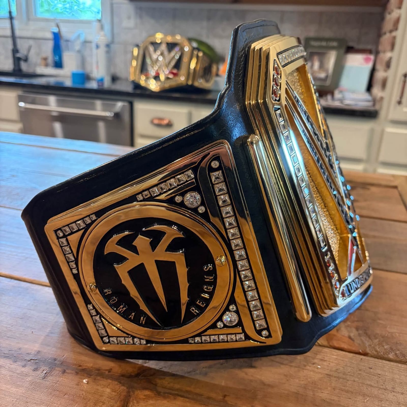 Customized WWE Undisputed Championship replica belt with Roman Reigns \