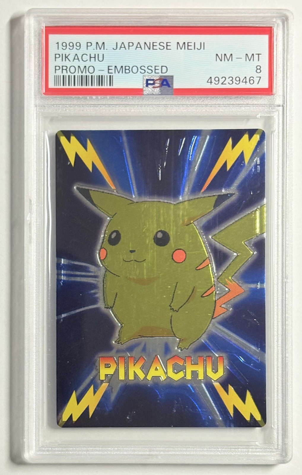 1999 Pokémon Japanese Meiji Promo Pikachu Embossed PSA 8