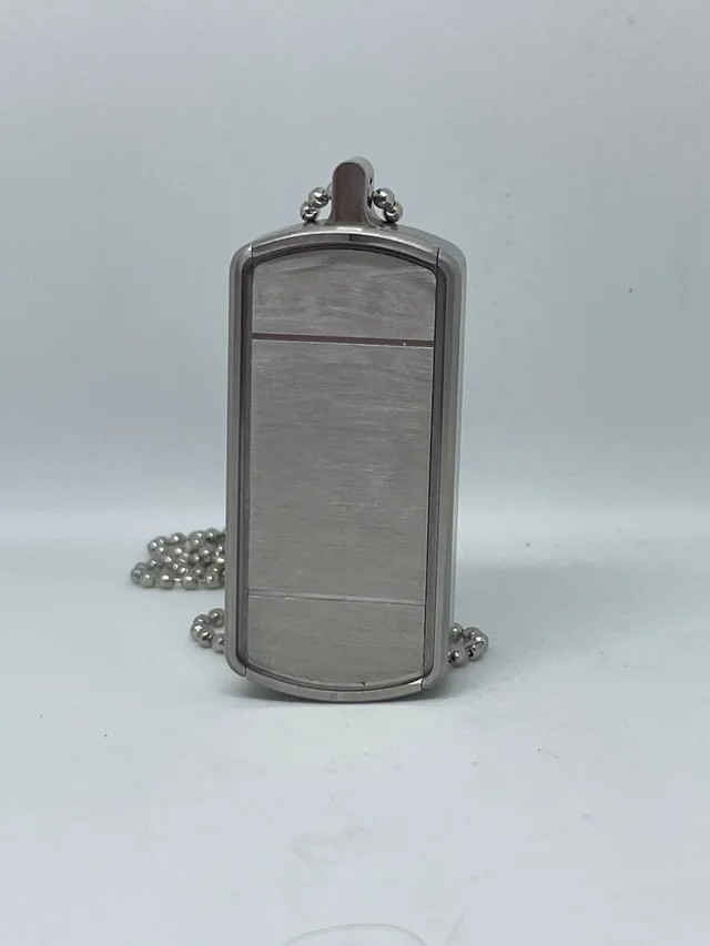 The Bourne Legacy DogTagPillBox ©® Aluminum or Brass Movie Design IN STOCK The Bourne Legacy DogTagPillBox ©® Aluminum or Brass Movie Design IN STOCK