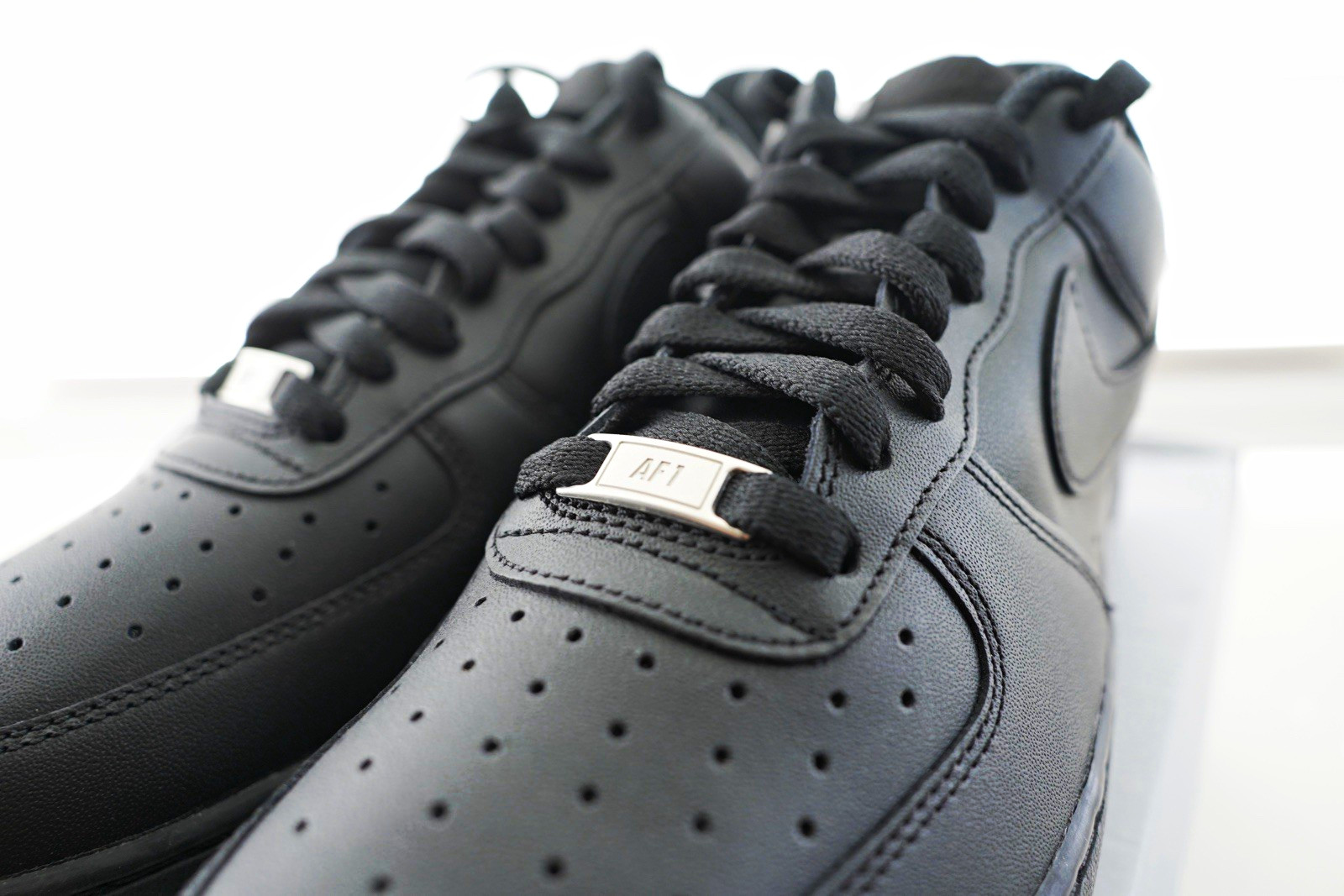 Nike Air Force 1 Low Black Men’s Solid Low Top Sneaker Athletic Casual Nike Air Force 1 Low Black Men’s Solid Low Top Sneaker Athletic Casual