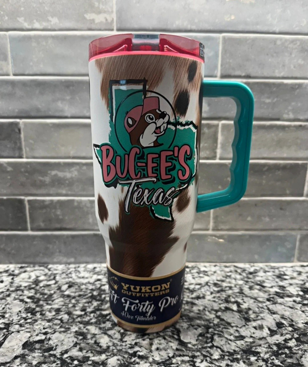 Buc-ee\'s 40 oz Texas Tumbler w/ Handle Slide-Lock Lid Yukon Outfitters. Buc-ee\'s 40 oz Texas Tumbler w/ Handle Slide-Lock Lid Yukon Outfitters.