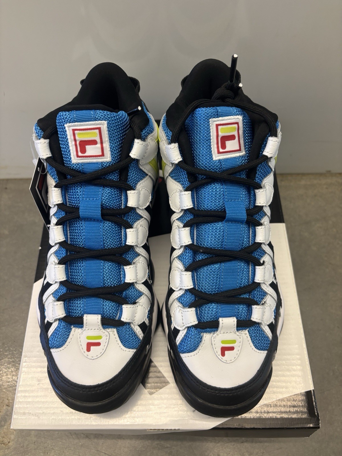 FILA Spaghetti Leather Mid Top Lace Up Men’s Sneaker Blue/White/Black/Yellow FILA Spaghetti Leather Mid Top Lace Up Men’s Sneaker Blue/White/Black/Yellow