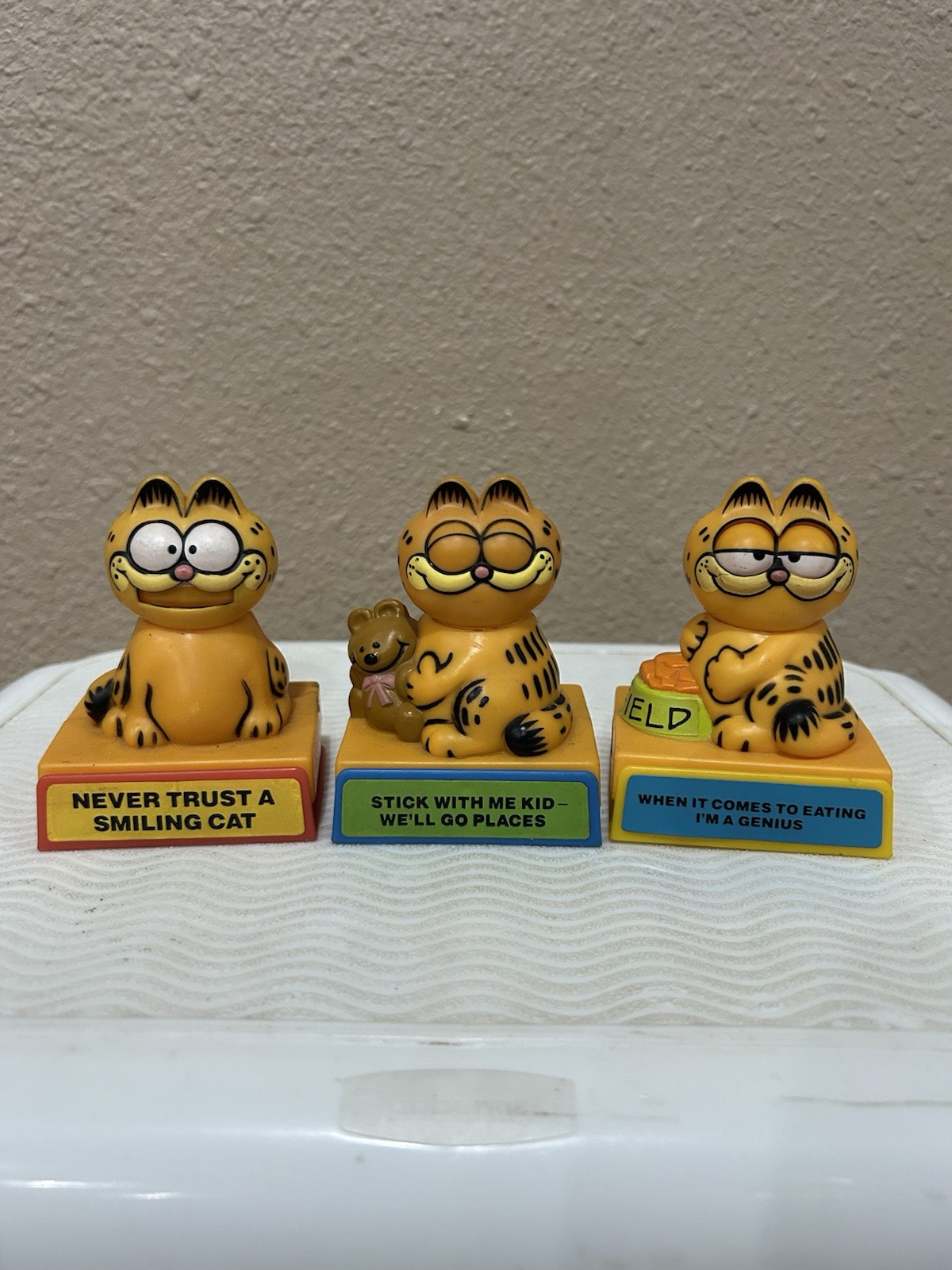 VTG Lot Of 3 Garfield Push Down Moving Figures Quotes Smiling Cat Eating Genius VTG Lot Of 3 Garfield Push Down Moving Figures Quotes Smiling Cat Eating Genius