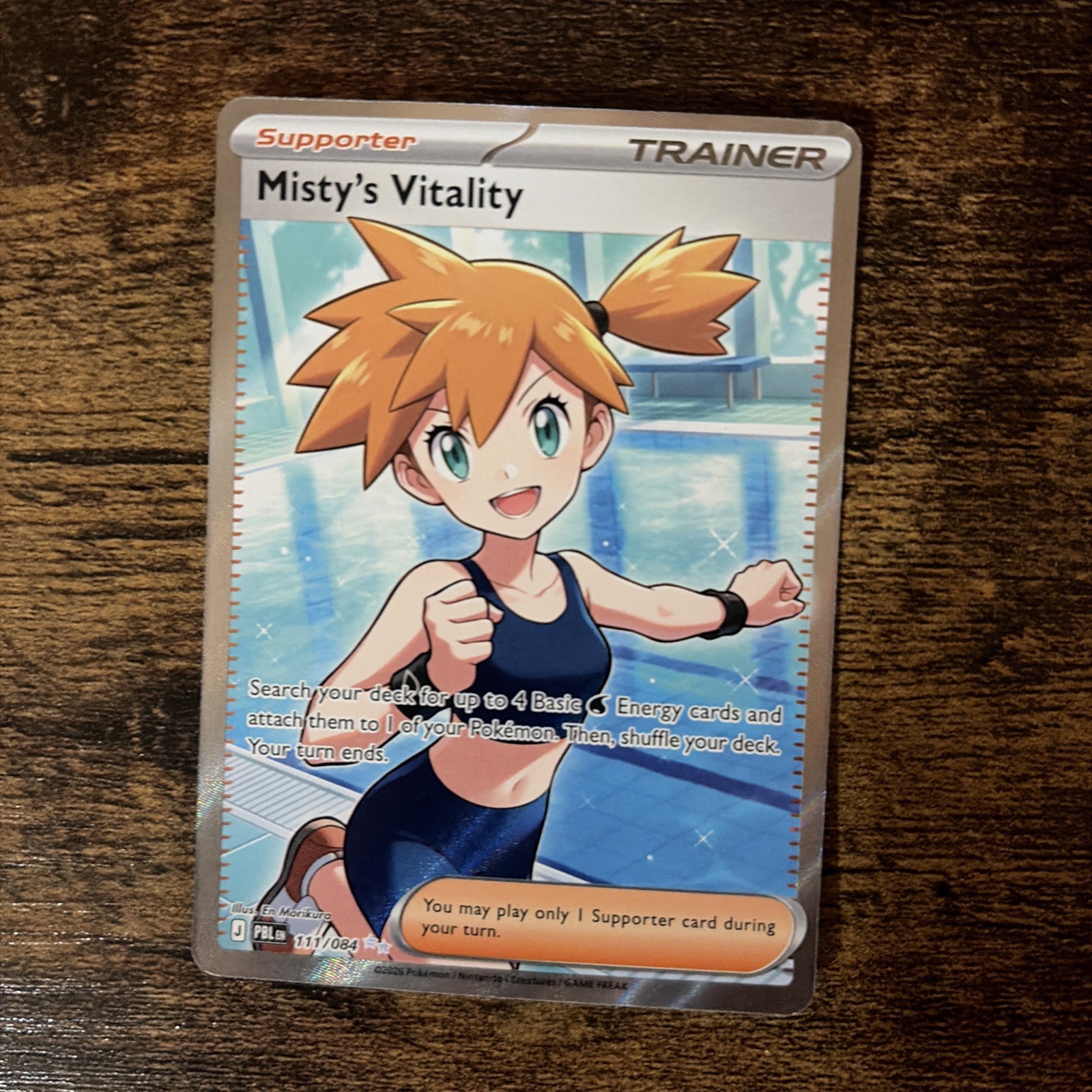 Misty's Vitality: MINT 111/084 Me05: Pitch Black Holo Misty's Vitality: MINT 111/084 Me05: Pitch Black Holo