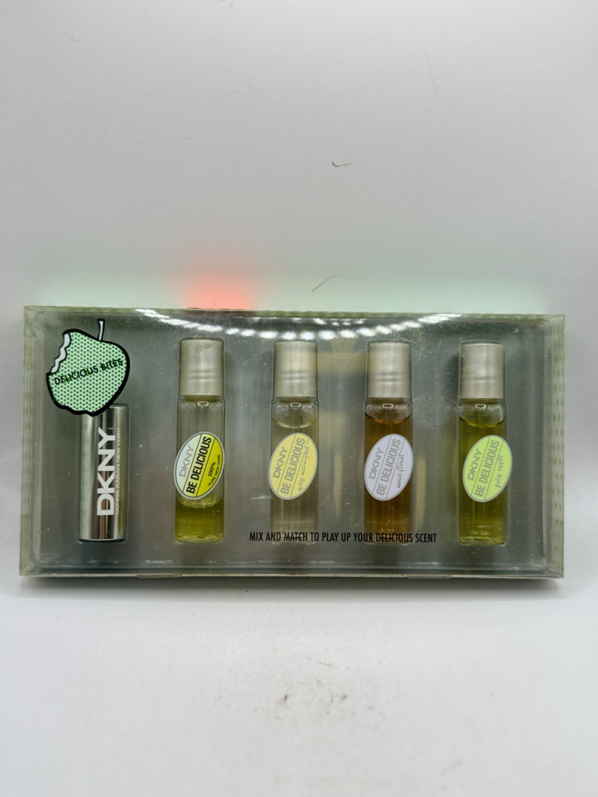 DELICIOUS APPLE-ESSENCES BY DNKY 5MLX4 EDP ROLLERBALL (NEW WITH BOX) DELICIOUS APPLE-ESSENCES BY DNKY 5MLX4 EDP ROLLERBALL (NEW WITH BOX)