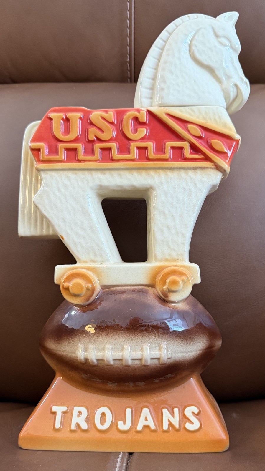 VINTAGE 1974 EZRA BROOKS USC TROJANS FOOTBALL CERAMIC DECANTER VINTAGE 1974 EZRA BROOKS USC TROJANS FOOTBALL CERAMIC DECANTER