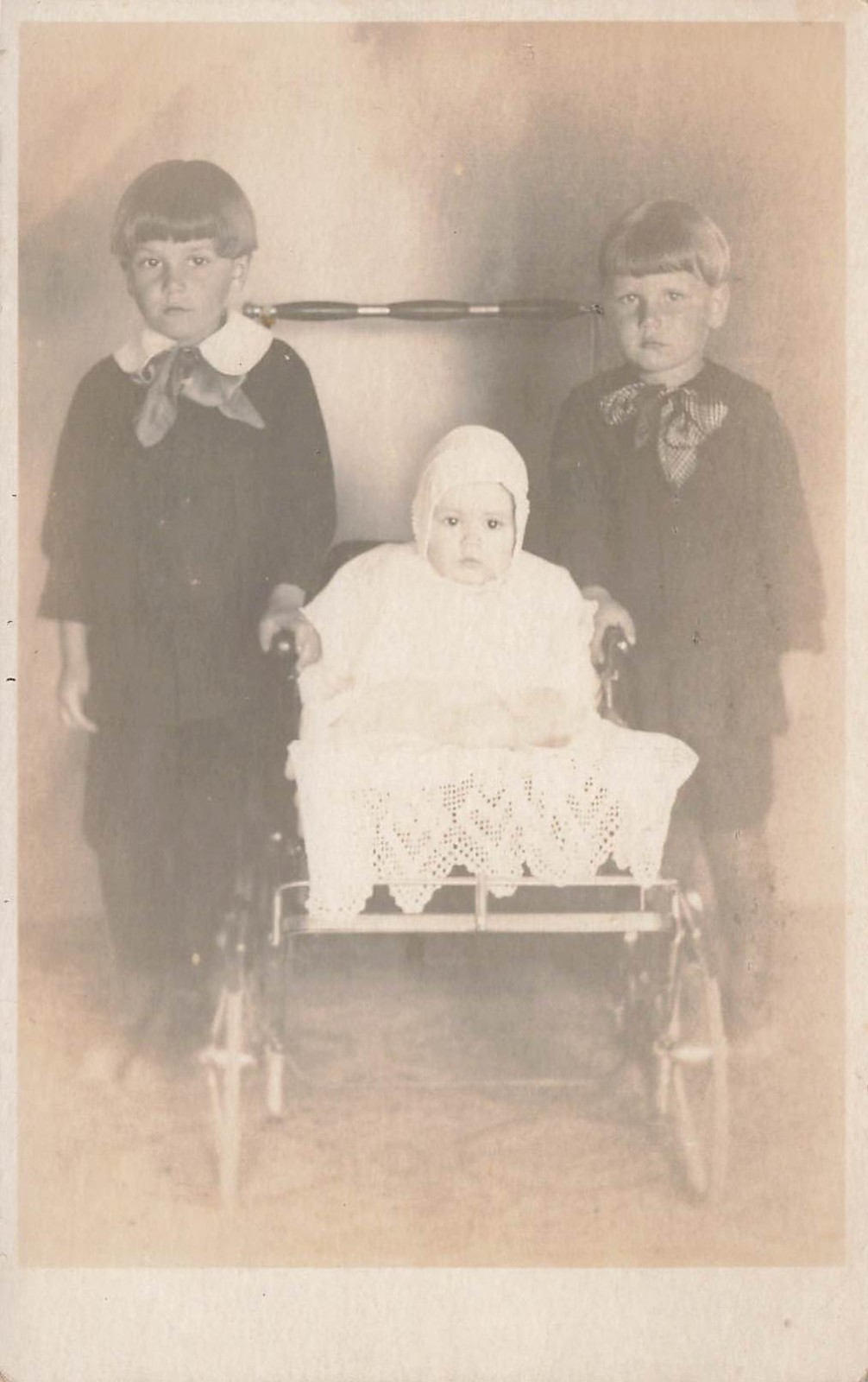 RPPC THREE CHILDREN STUDIO PORTRAIT BABY IN CARRIAGE c1910 PC 090126 V