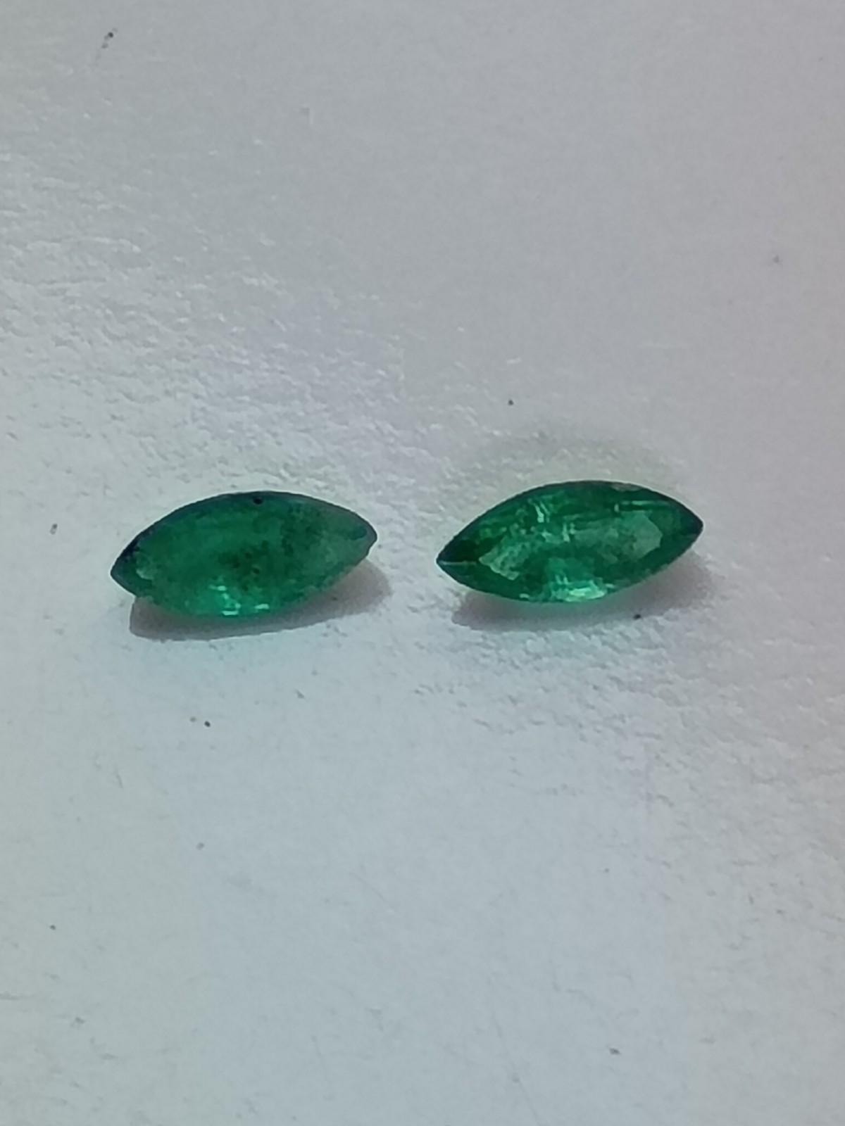 1 Pair Of Natural Colombian Emeralds Marquise Cut. Size 6x3 mm. Weight .55 Cts 1 Pair Of Natural Colombian Emeralds Marquise Cut. Size 6x3 mm. Weight .55 Cts