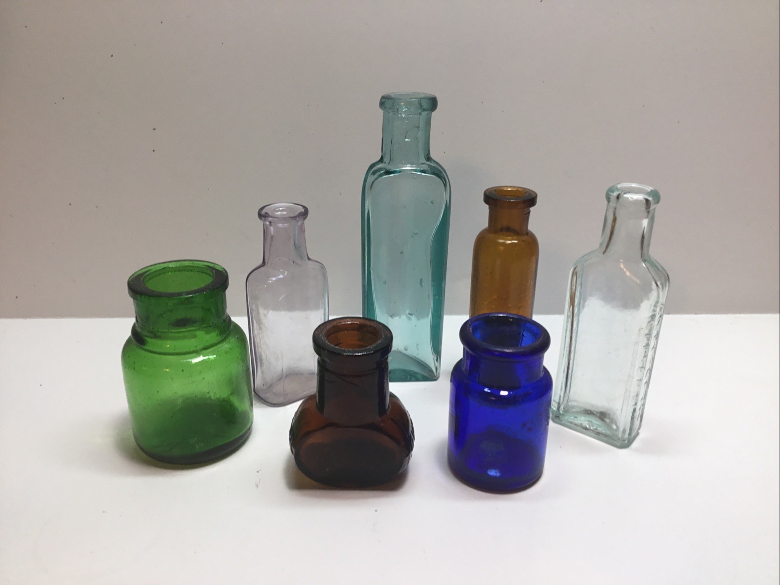 Antique 7 Piece Colorful Cork Top Bottle Lot. Antique 7 Piece Colorful Cork Top Bottle Lot.