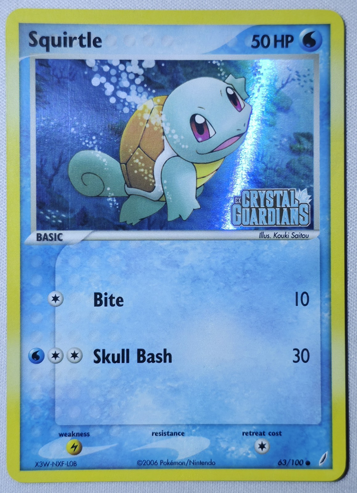 Pokémon TCG - Squirtle 63/100 Reverse Holo - 2006 EX Crystal Guardians - N/M Pokémon TCG - Squirtle 63/100 Reverse Holo - 2006 EX Crystal Guardians - N/M