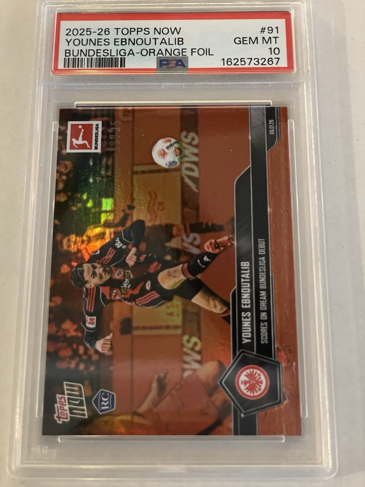 Topps 2025-26 Now Bundesliga Younes Ebnoutalib #91 RC Orange Foil/25 PSA 10 Topps 2025-26 Now Bundesliga Younes Ebnoutalib #91 RC Orange Foil/25 PSA 10