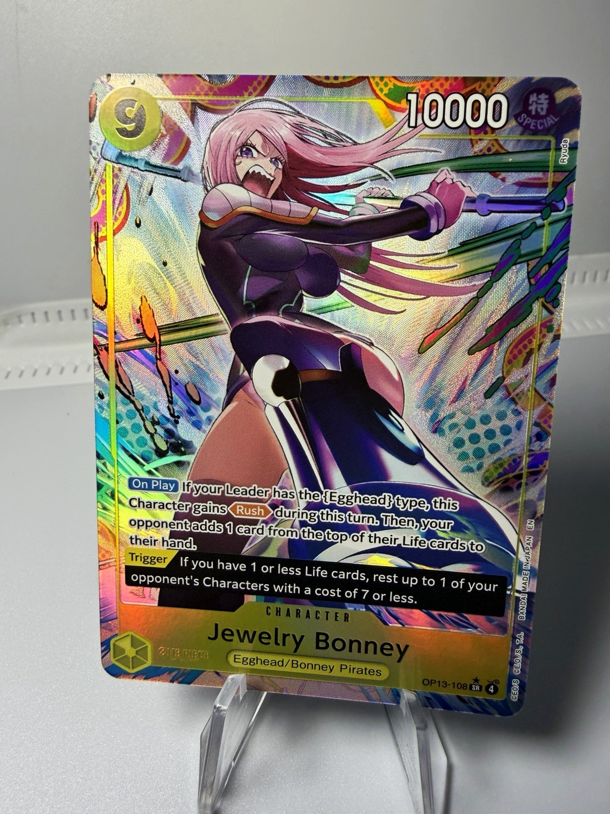 Bandai One Piece CCG Jewelry Bonney OP13-108 SP AA Holo Super Rare EN 10000 Bandai One Piece CCG Jewelry Bonney OP13-108 SP AA Holo Super Rare EN 10000