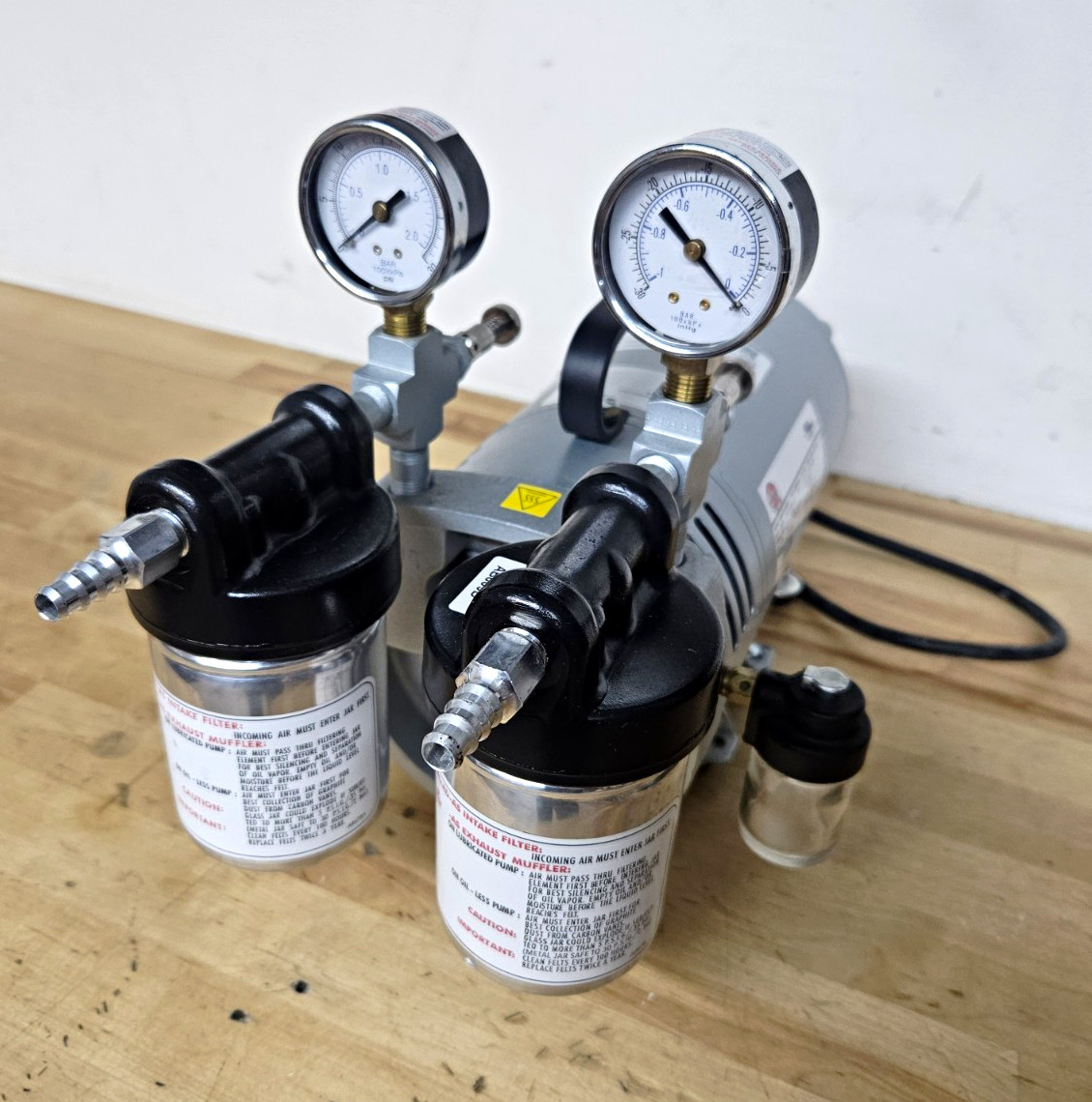 Gast Rotary Vane Vacuum Pump 0523-V4-G588NDX with Dual Gauges Filter/Mufflers Gast Rotary Vane Vacuum Pump 0523-V4-G588NDX with Dual Gauges Filter/Mufflers