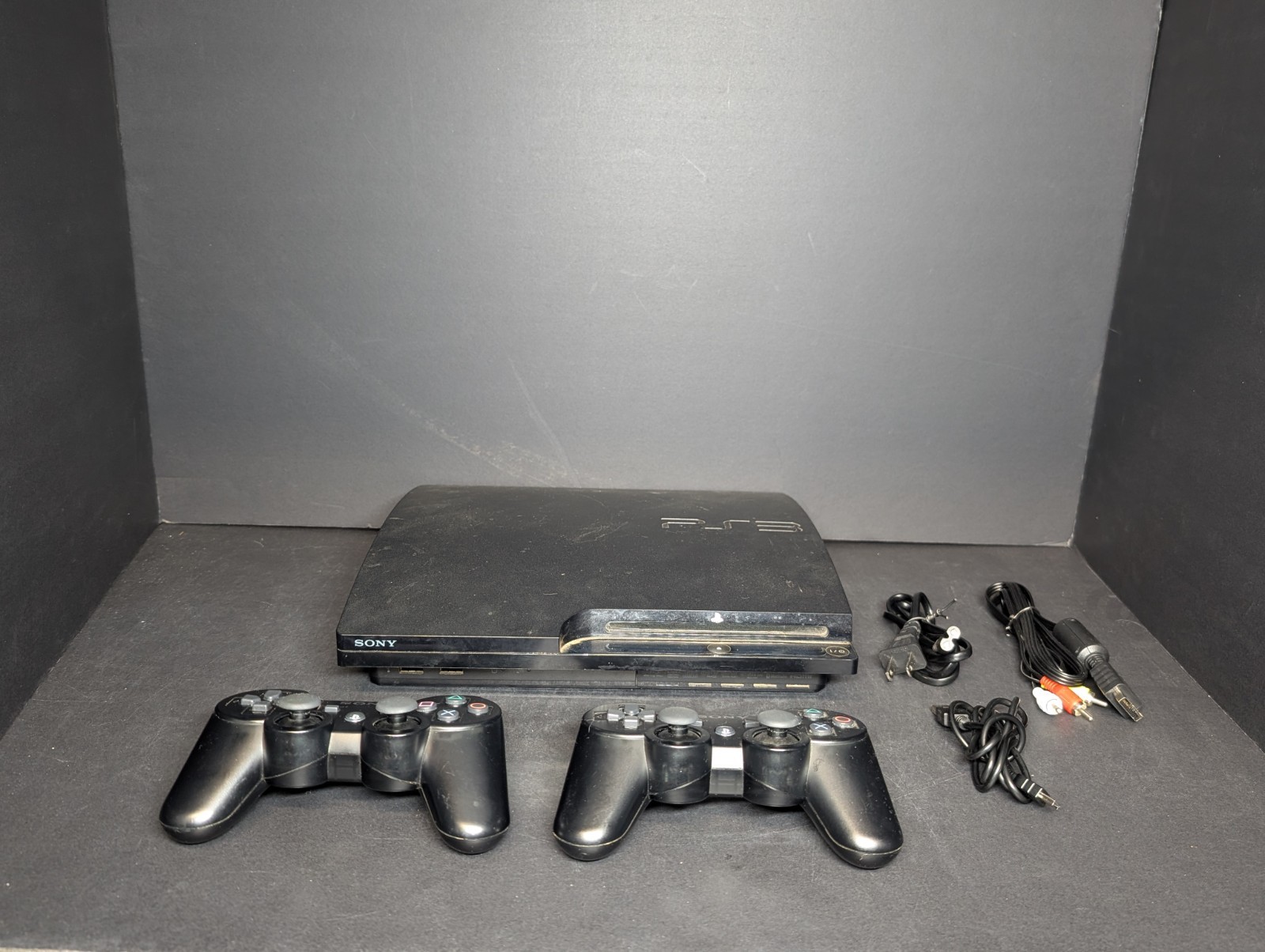 Sony PlayStation 3 PS3 Slim Console 120GB (2001A) w/Controllers & Cables Working Sony PlayStation 3 PS3 Slim Console 120GB (2001A) w/Controllers & Cables Working